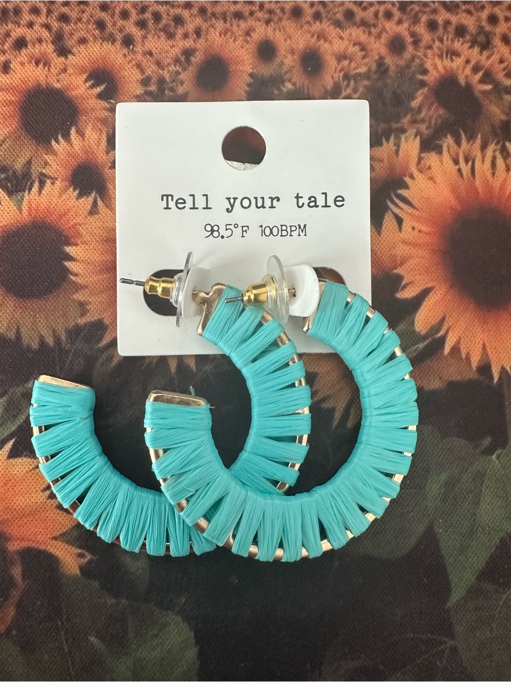 Tell Your Tale Gold Tone Turquoise Wrapped Hoop Raffia Earrings